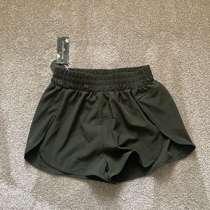 Green running shorts. Brand new. Never worn.
